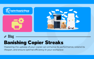 Copier Supply Store blog graphic titled 'Banishing Copier Streaks.' Image shows an office copier surrounded by piles of paper, symbolizing maintenance tips for avoiding copier streaks and enhancing performance